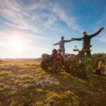 Riding an Quad 2 Couple driving off-road